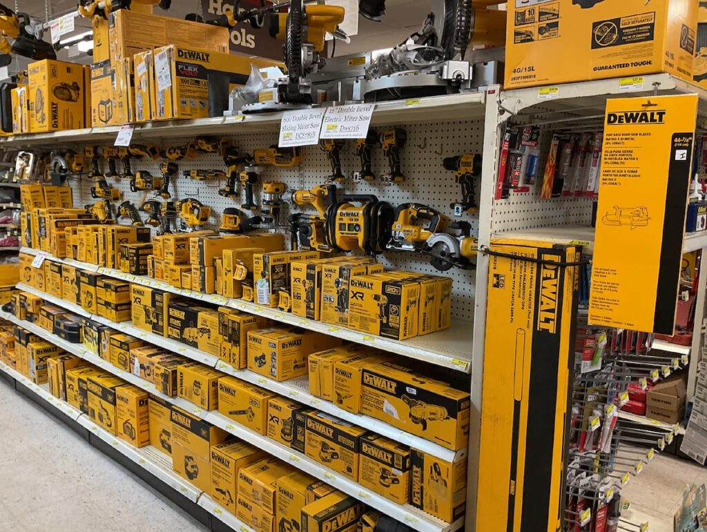 DeWalt power tools, drills, and saws stocked across yellow shelving at Shady Lane Hardware in central Pennsylvania.